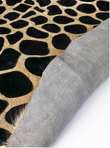 Pele de vaca natural castanha-clara